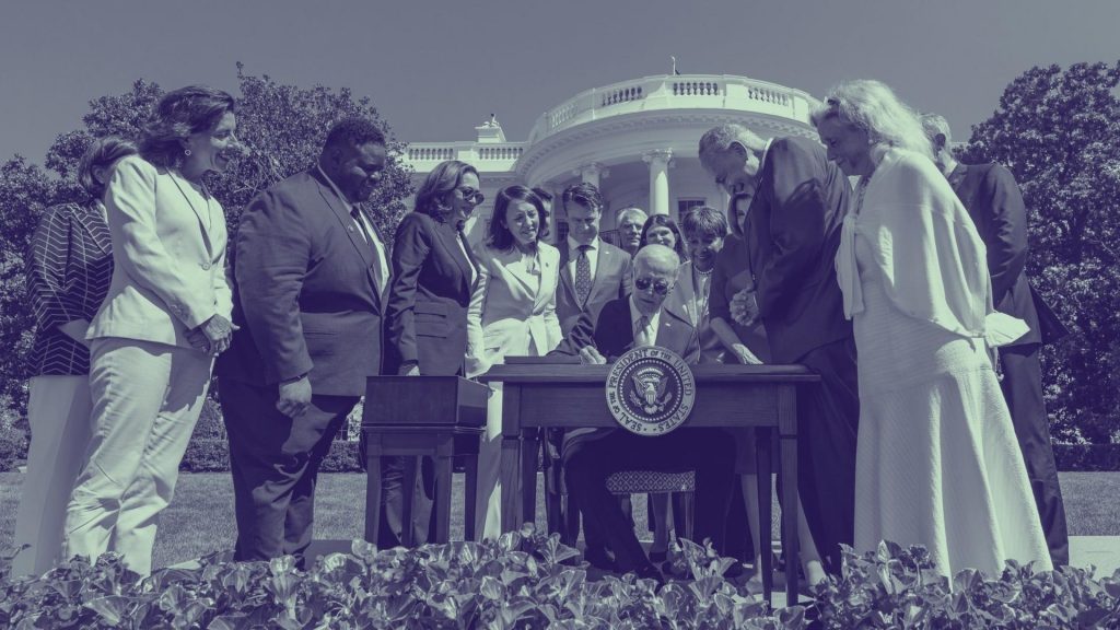 President Biden signing the CHIPS and Science Act on the White House South Lawn