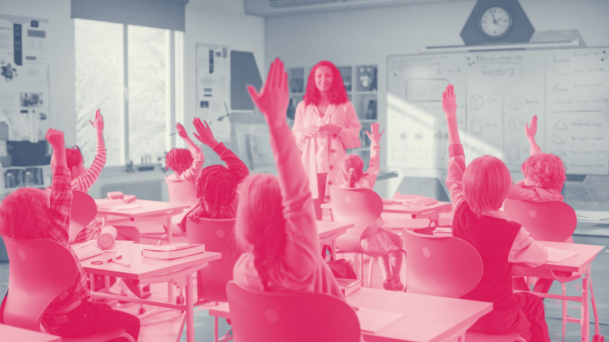 teacher standing in front of a classroom of children